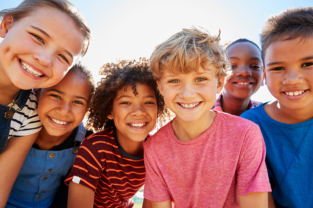 Smiling kids who received counseling